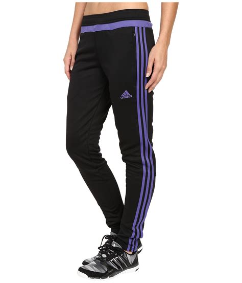 black on black adidas pants.